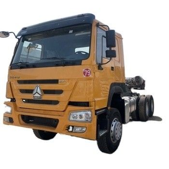 Un buen precio. 30 toneladas de segunda mano 6x4 HOWO usado camión de descarga con tirador 371 camión de descarga usado amarillo conducción a la izquierda camión SINO en línea