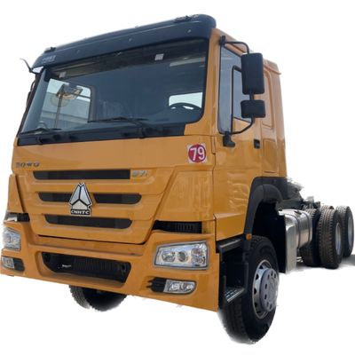 Un buen precio. Camión amarillo usado SINO Camión de 10 ruedas RHD 30 toneladas 6x4 HOWO Camión de descarga con tirador Camión de descarga 375 Camión de descarga con peso bruto del vehículo 15-20T en línea