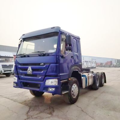 Un buen precio. Precio asequible HOWO 6X4 375HP cabeza de camión tractor usado con cabina cómoda en África en línea